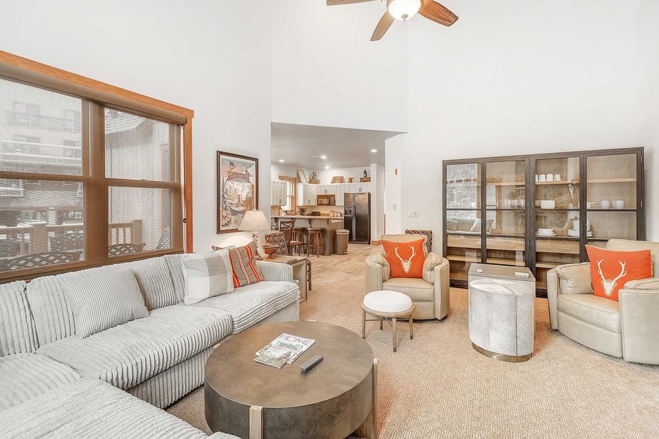 Living area with sectional seating and TV