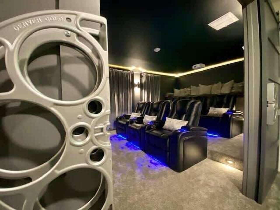 Premium theatre seating for + elevated platform with giant custom memory foam mattress seats 