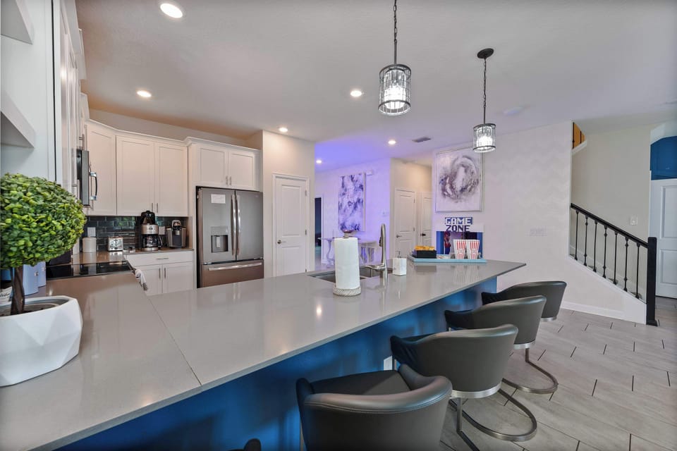 Large kitchen with open floor plan to living and dining room. Equipped with all appliances, cookware and utensils 