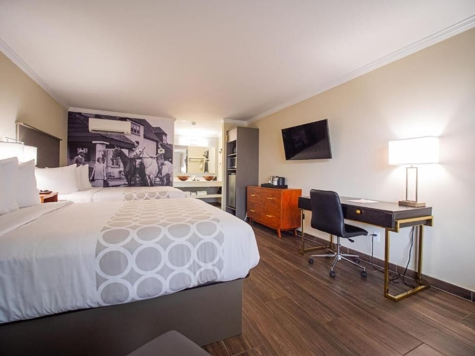 Stretch out after exploring, with roomy beds and sleek workspace.