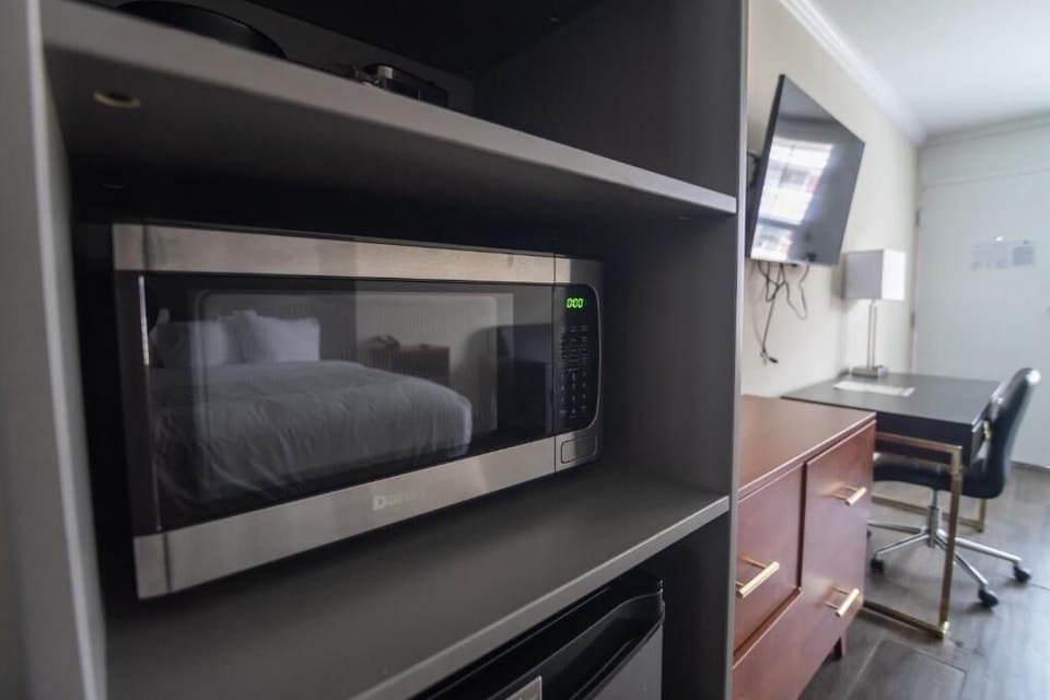 Heat up late-night bites with convenient in-room microwave access.