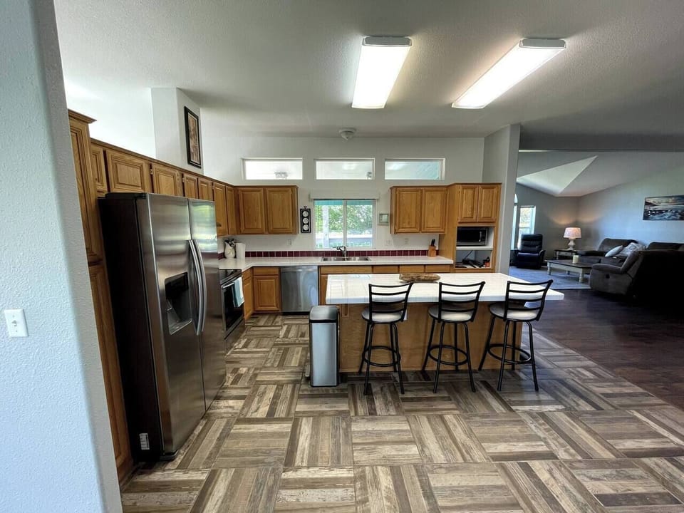 Large kitchen with island and dining space.