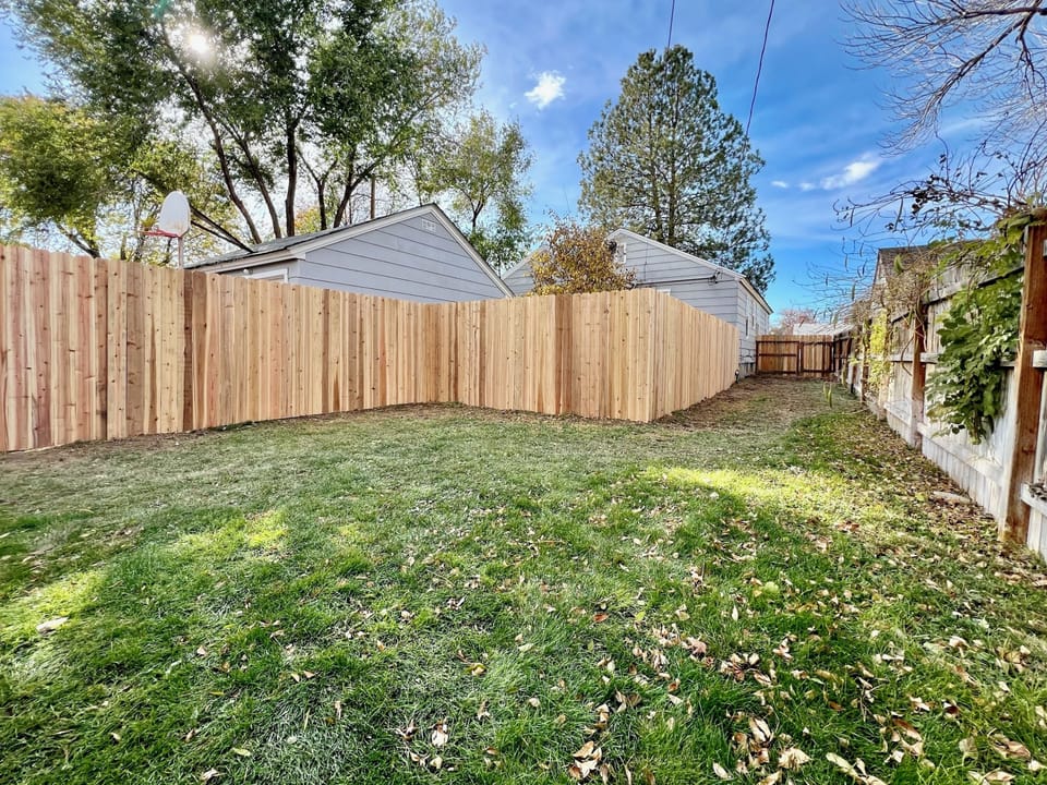 Private fenced yard for kids and pets to run