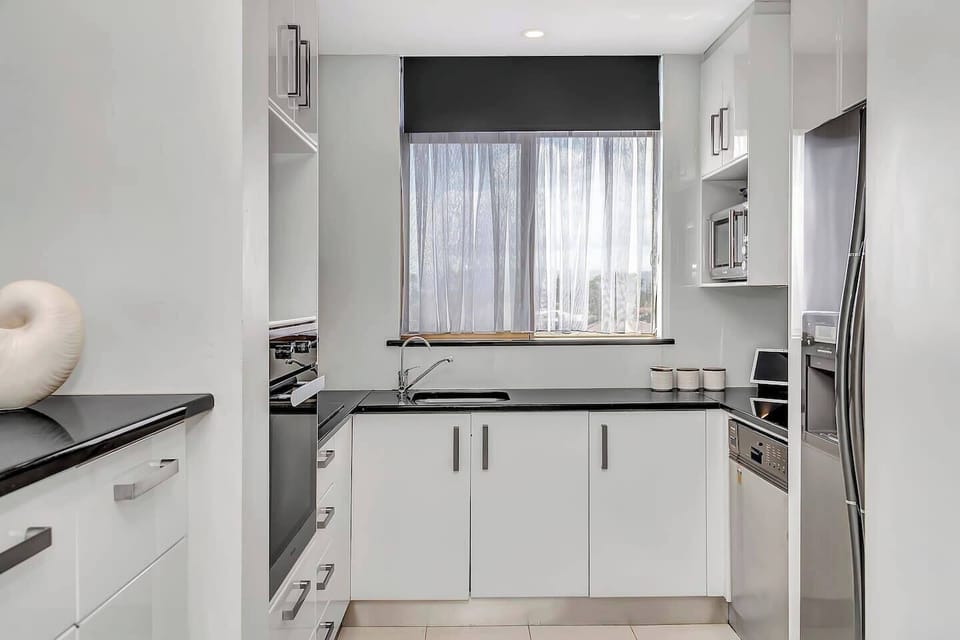Cook up memories in a fully equipped kitchen with an oven, dishwasher, Nespresso machine, and all the essentials for home-prepped meals.