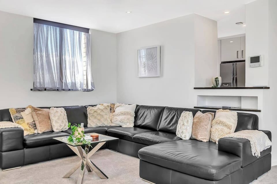 Gather with loved ones on the oversized sofa and enjoy year-round comfort with aircon and heating—your cosy hub for entertainment and connection.