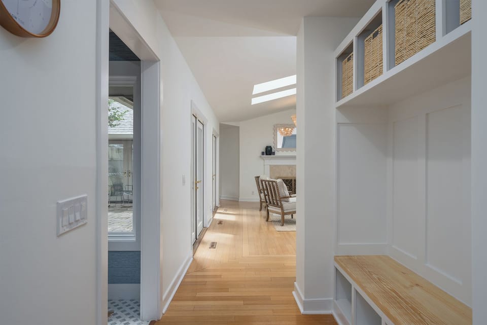 Entrance with fun mudroom bench to organize flip flops, tennis shoes, beach towels