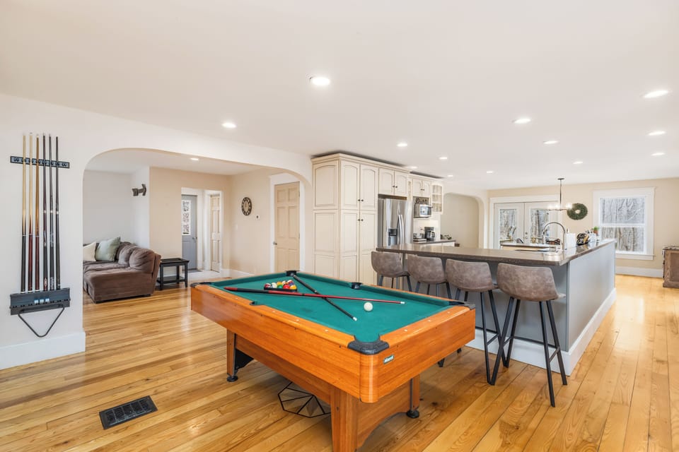 The Main Floor - complete with Living Rooms, 2.5 Baths, Dining and Pool Table.