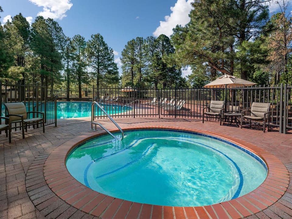 Sink into the bubbling hot tub after a day outdoors.