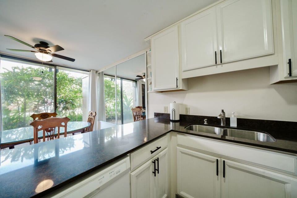 Sleek kitchen layout offering plenty of prep space