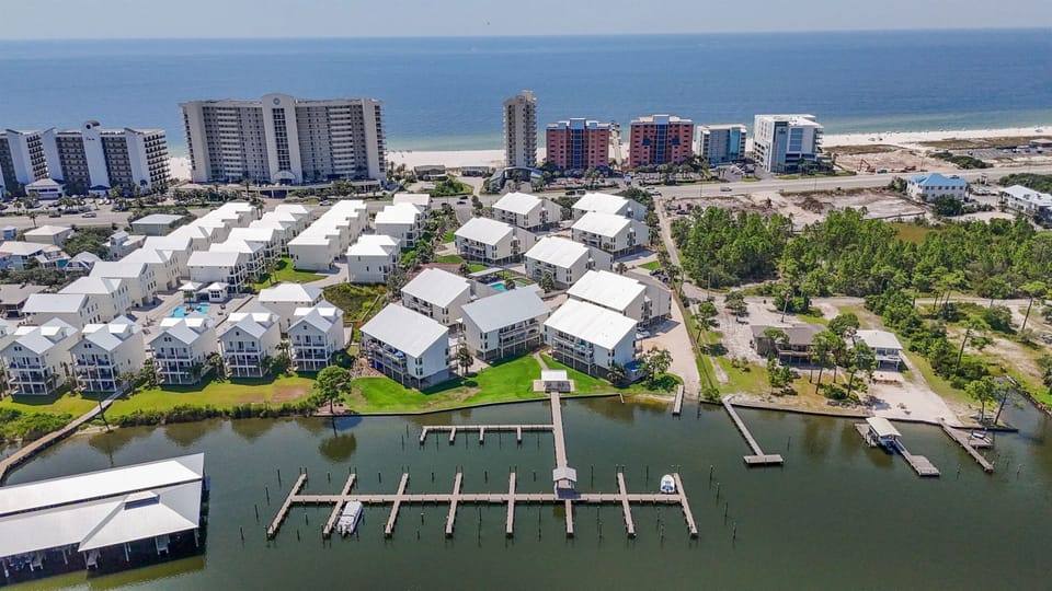 Experience stunning waterfront views from the Cotton Bayou docks , overlooking serene bay waters. Watch boats glide by and soak in the beauty of the coastal scenery right from your doorstep.