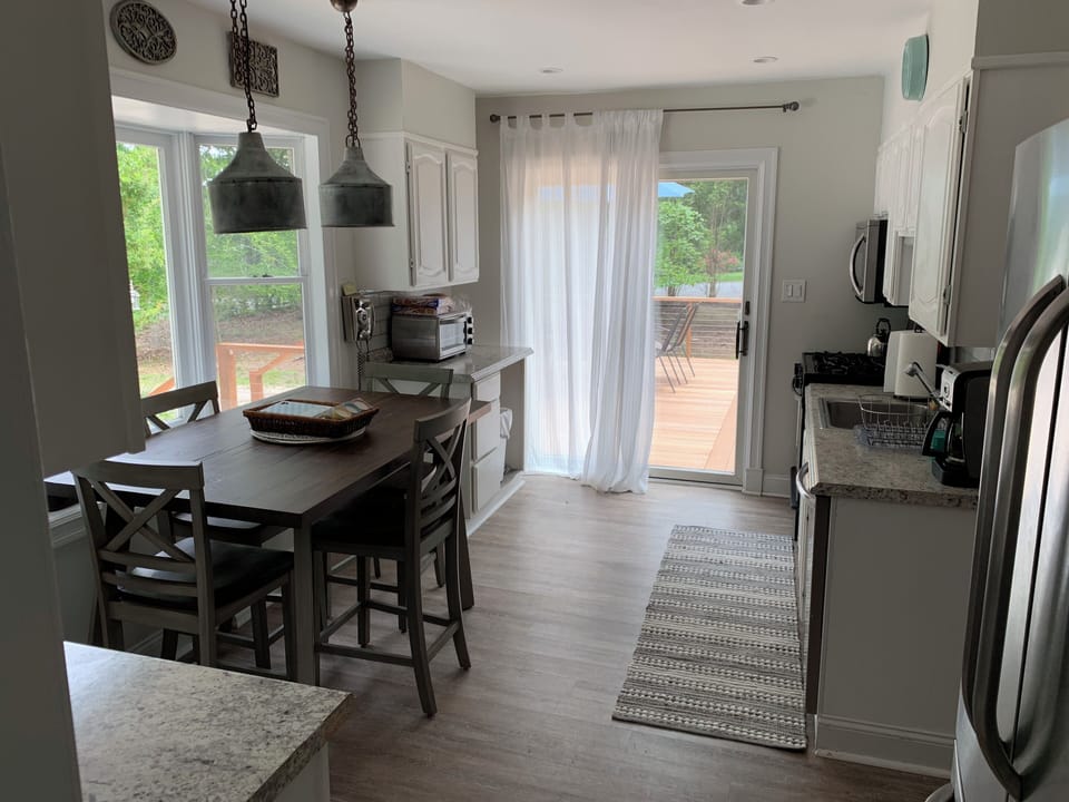 Kitchen with slider to deck