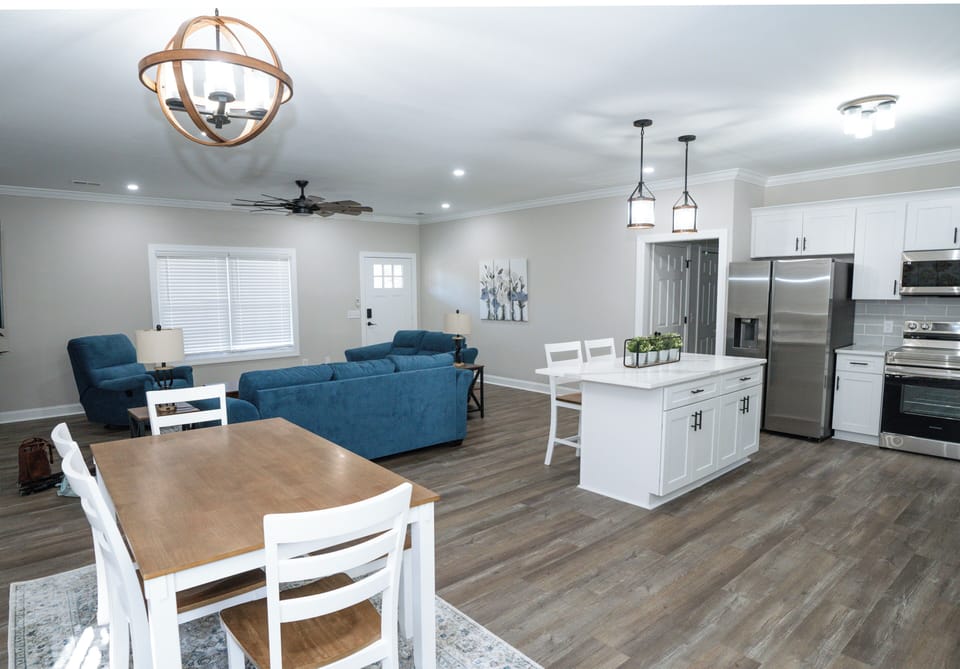 Open-concept living, dining, and kitchen perfect for gathering