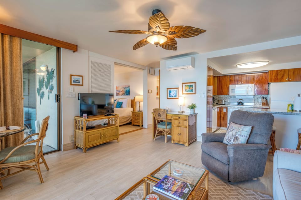 Spacious layout with a desk.