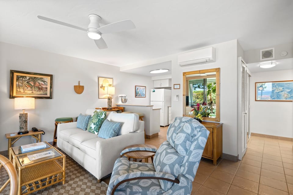 Spacious open-concept living and dining area seamlessly connected to the kitchen