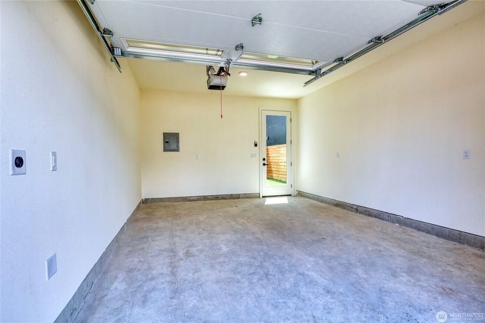 Garage with EV charger.