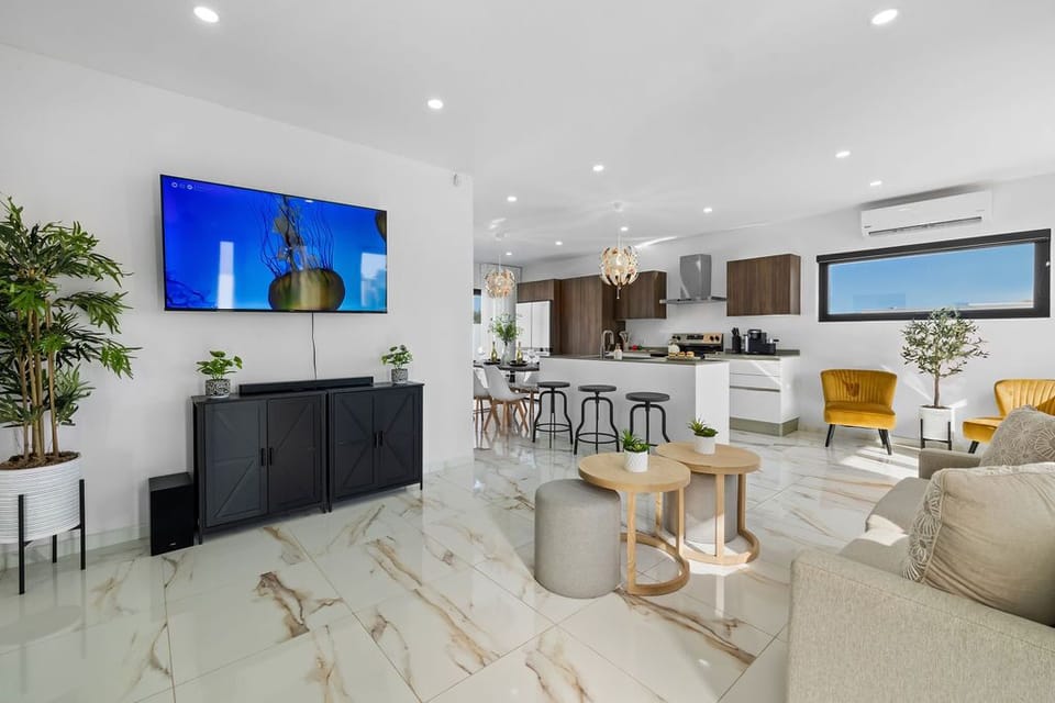 Step into modern luxury with this stunning open-concept property. From the sleek, marble-look floors to the cozy, high-end finishes, every detail is designed for your ultimate comfort and style.