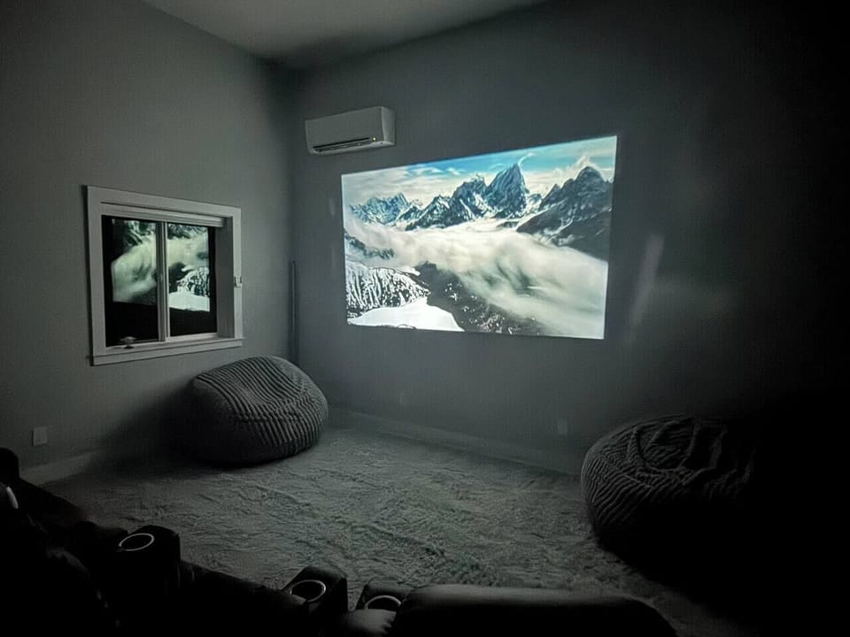 Watch projected DVDs with theater seating, giant bean bags, and plenty of throw blankets in the detached studio. We provide several dozen DVDs to choose from.