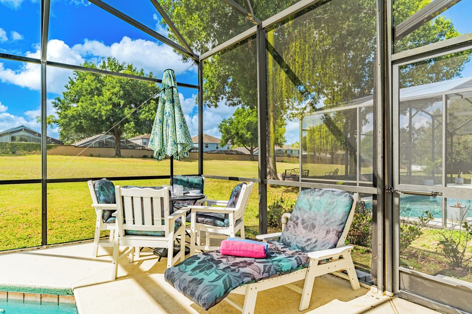 Relax in your own private screened-in pool and spa with peaceful views.