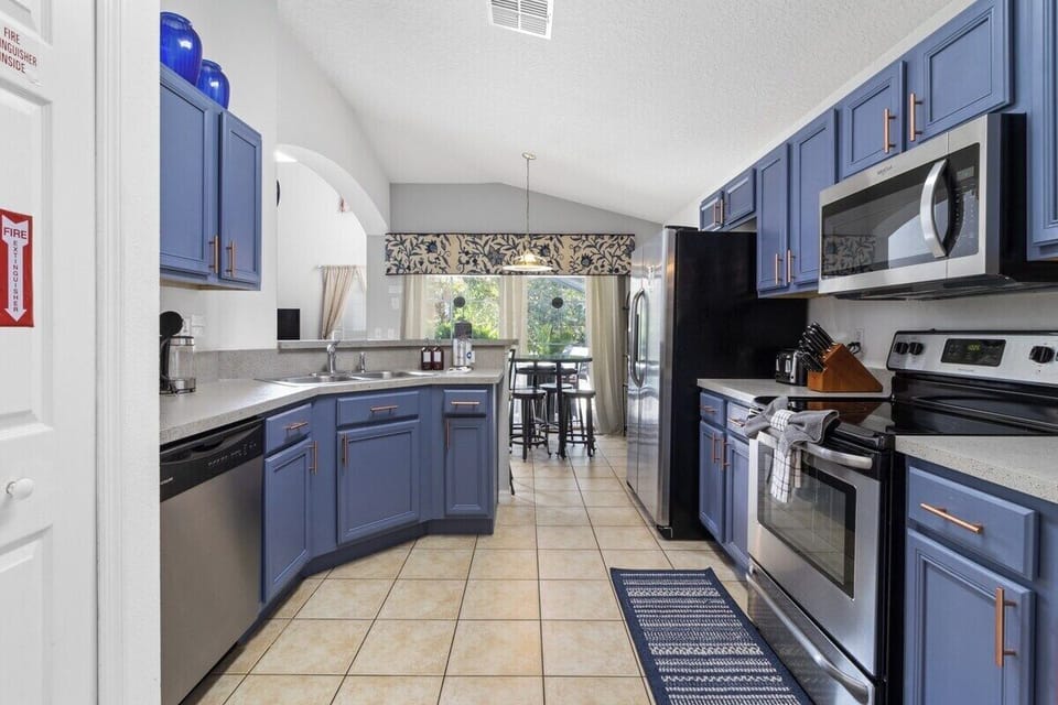 The kitchen boasts an impressive modern upgrade, seamlessly combining functionality with style. Featuring state-of-the-art appliances.