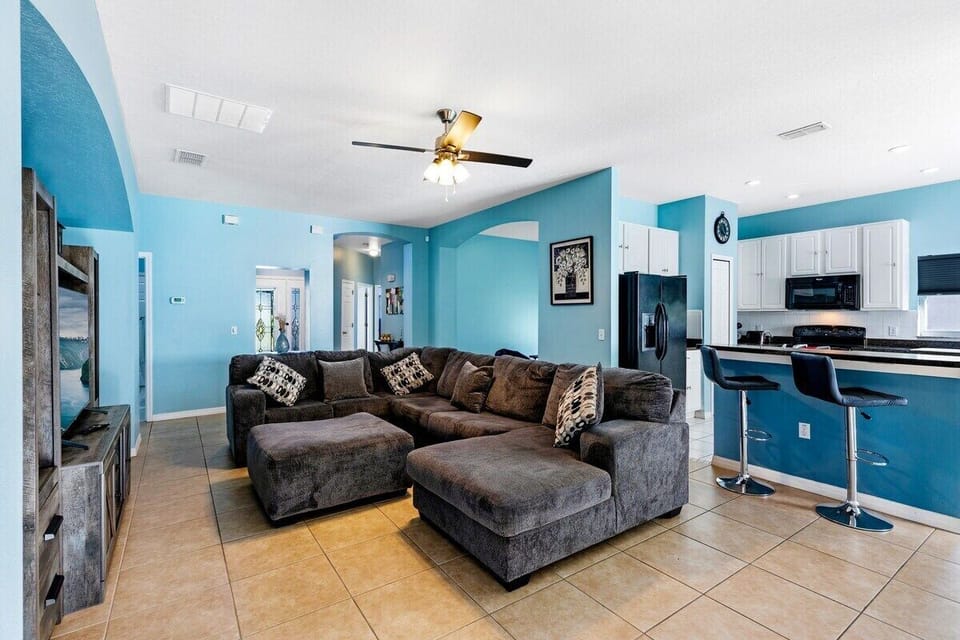 This bright and airy space is perfect for relaxing with family or entertaining guests.
