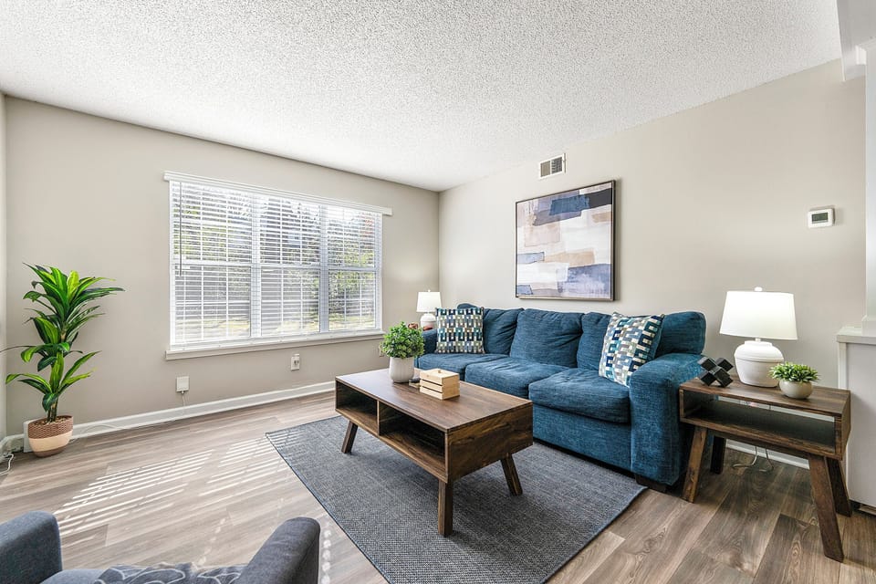 Relax in a bright Upper Westside apartment with smart TV and comfortable seating.