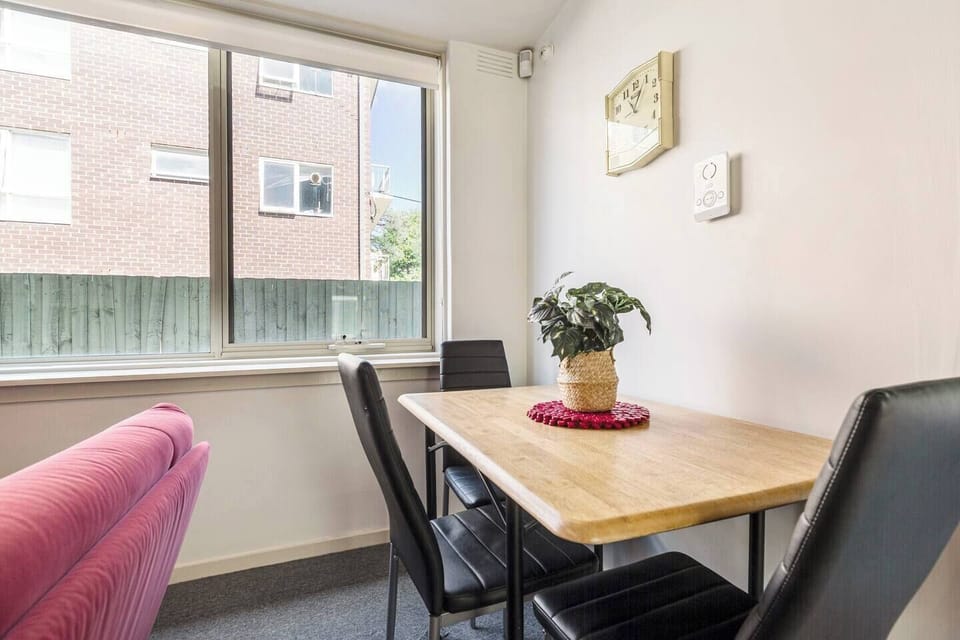 Gather around the three-seater dining table, seamlessly blending into the living room for a relaxed and sociable atmosphere.