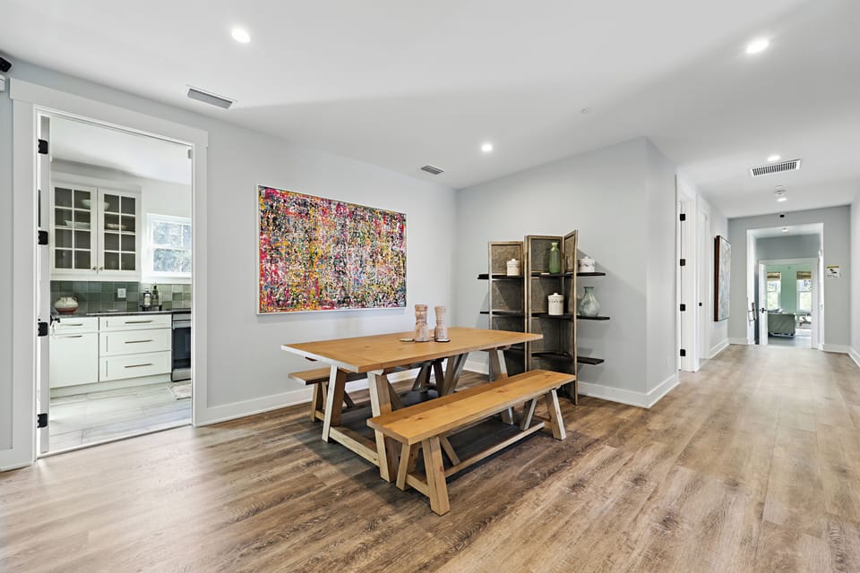 Upstairs flex space includes dining option next to kitchenette

