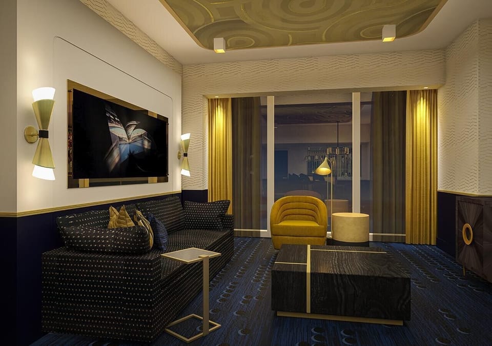Unwind on plush seating beneath warm, ambient designer lighting.