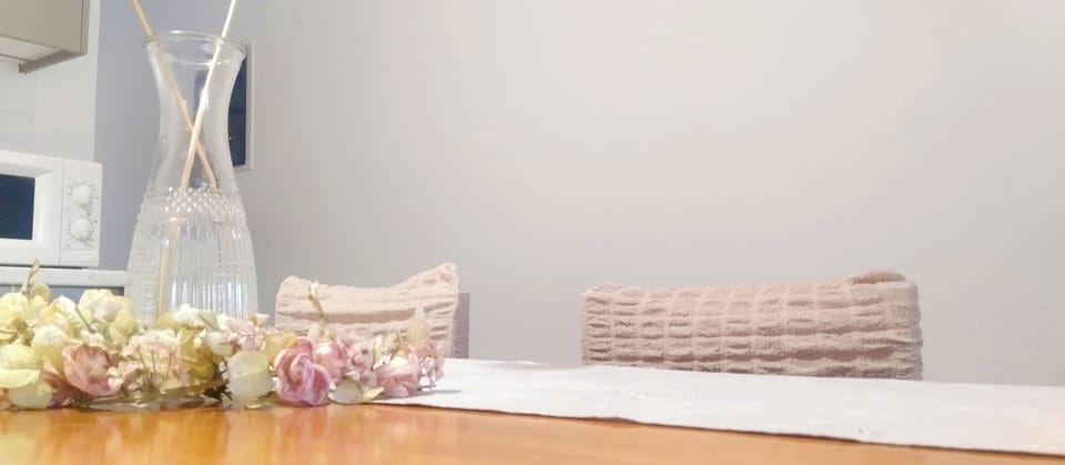 Dining table can expand to serve more than six.
