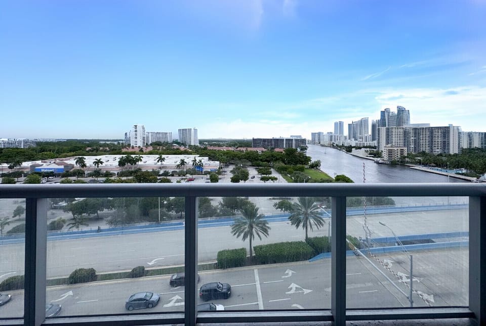 Private balcony with outdoor seating and skyline views.