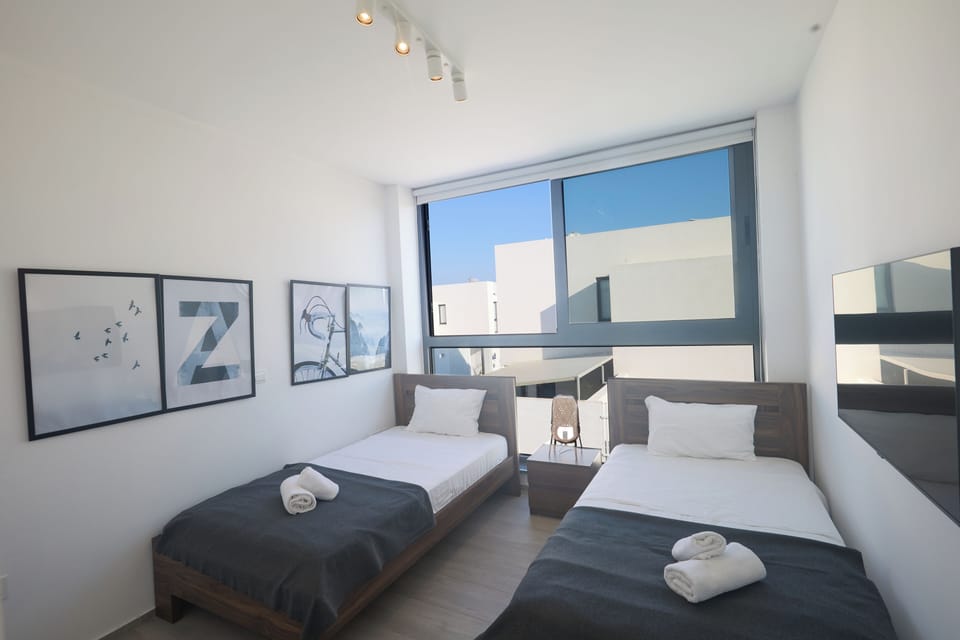 Bedroom 3 with two single beds