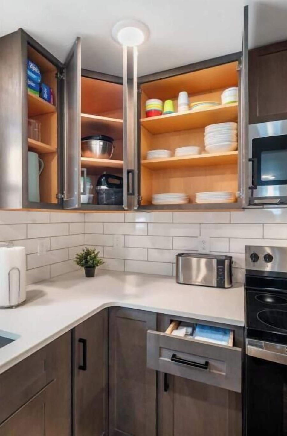 Kitchen is fully stocked with everything you need for a comfortable stay—from plates, bowls and kid-friendly cups to mixing bowls, storage bags and essential cooking tools. Thoughtfully organized cabinets and easy-access drawers make meal prep simple