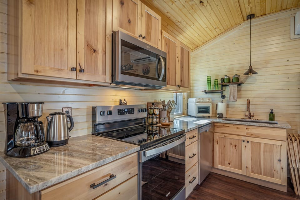 Well equipped kitchen with stainless appliances and granite countertops:)