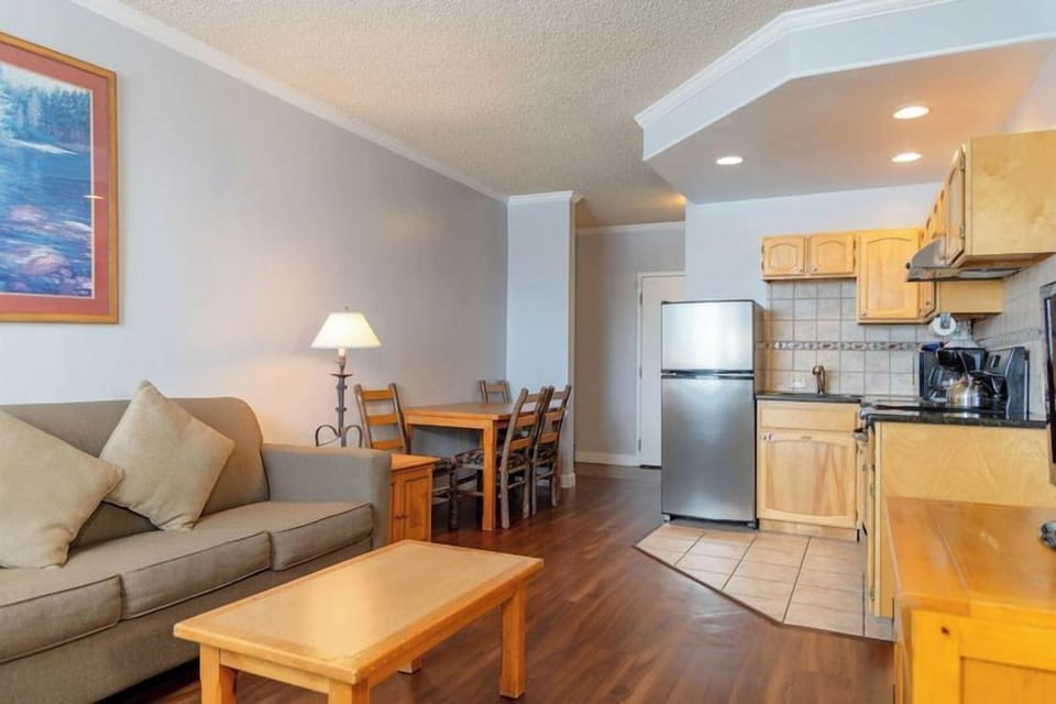 Gather for casual meals at the cozy dining table.