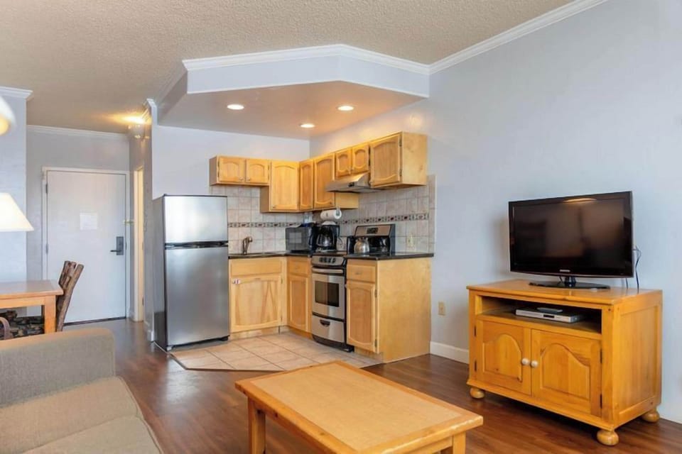 Unwind with a movie beside your convenient in-room kitchenette.