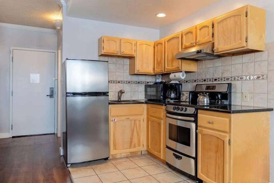 Cook easy meals with full-size appliances and ample counters.