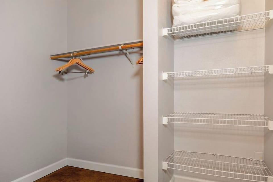 Settle in with simple, spacious storage for longer stays.