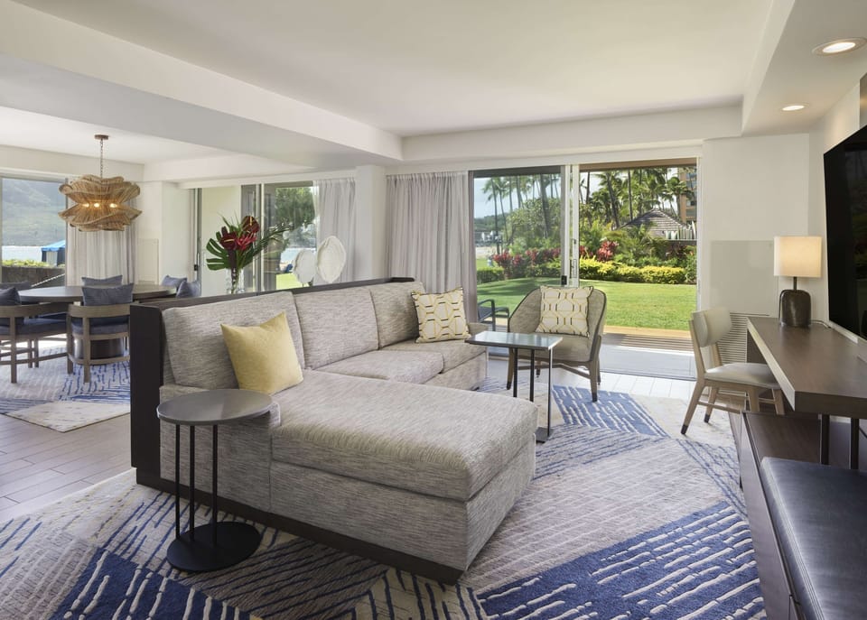 Stretch out in airy comfort with garden views all around.