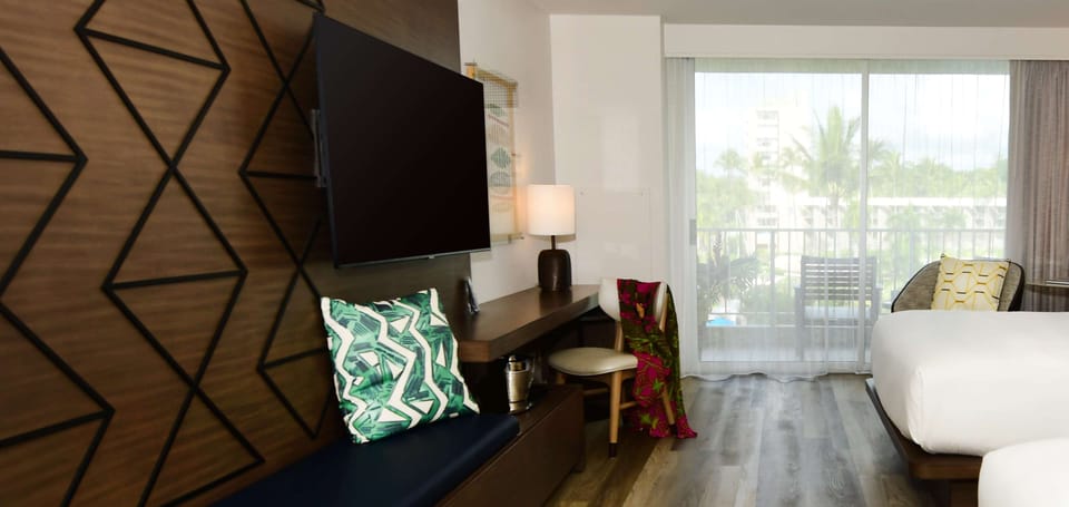 Lounge comfortably after beach days with a big-screen TV.