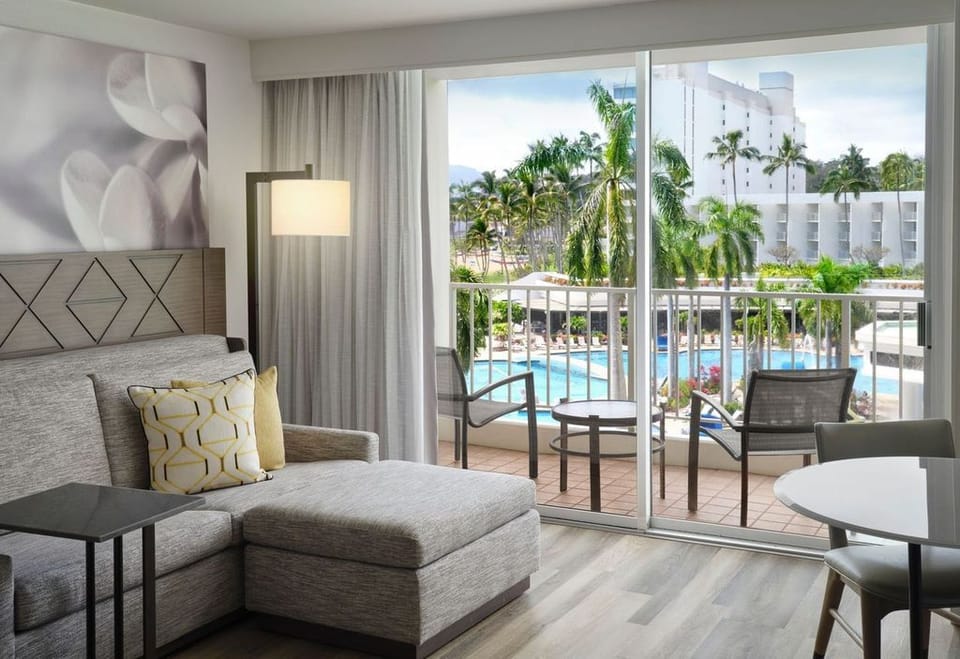 Unwind on the sofa and watch the pool sparkle.