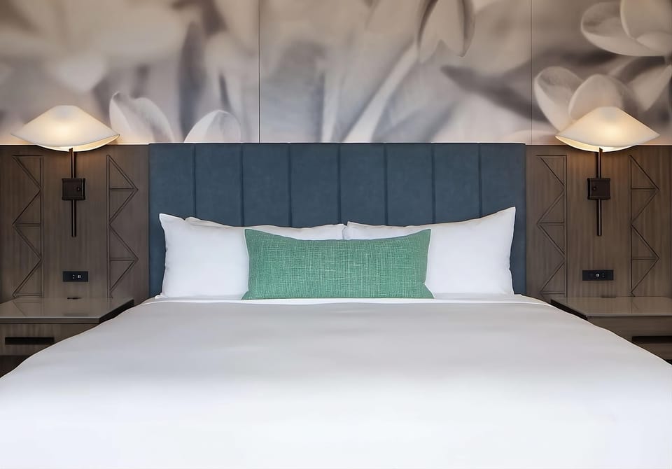 Sink into plush bedding for a deeply restful night.
