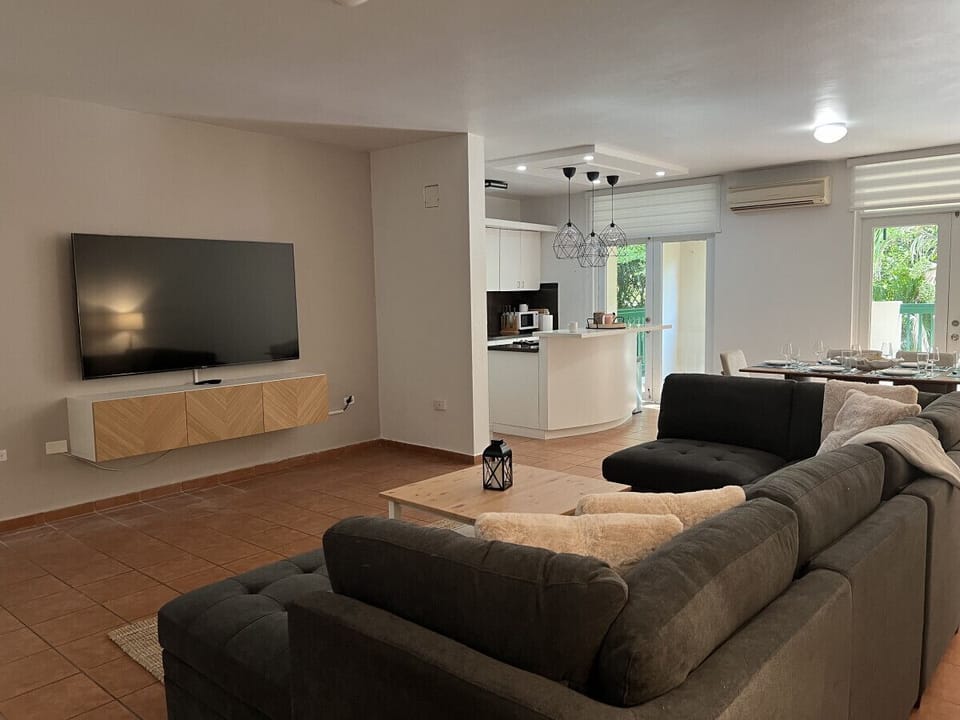 Living Area with view of kitchen and dining area