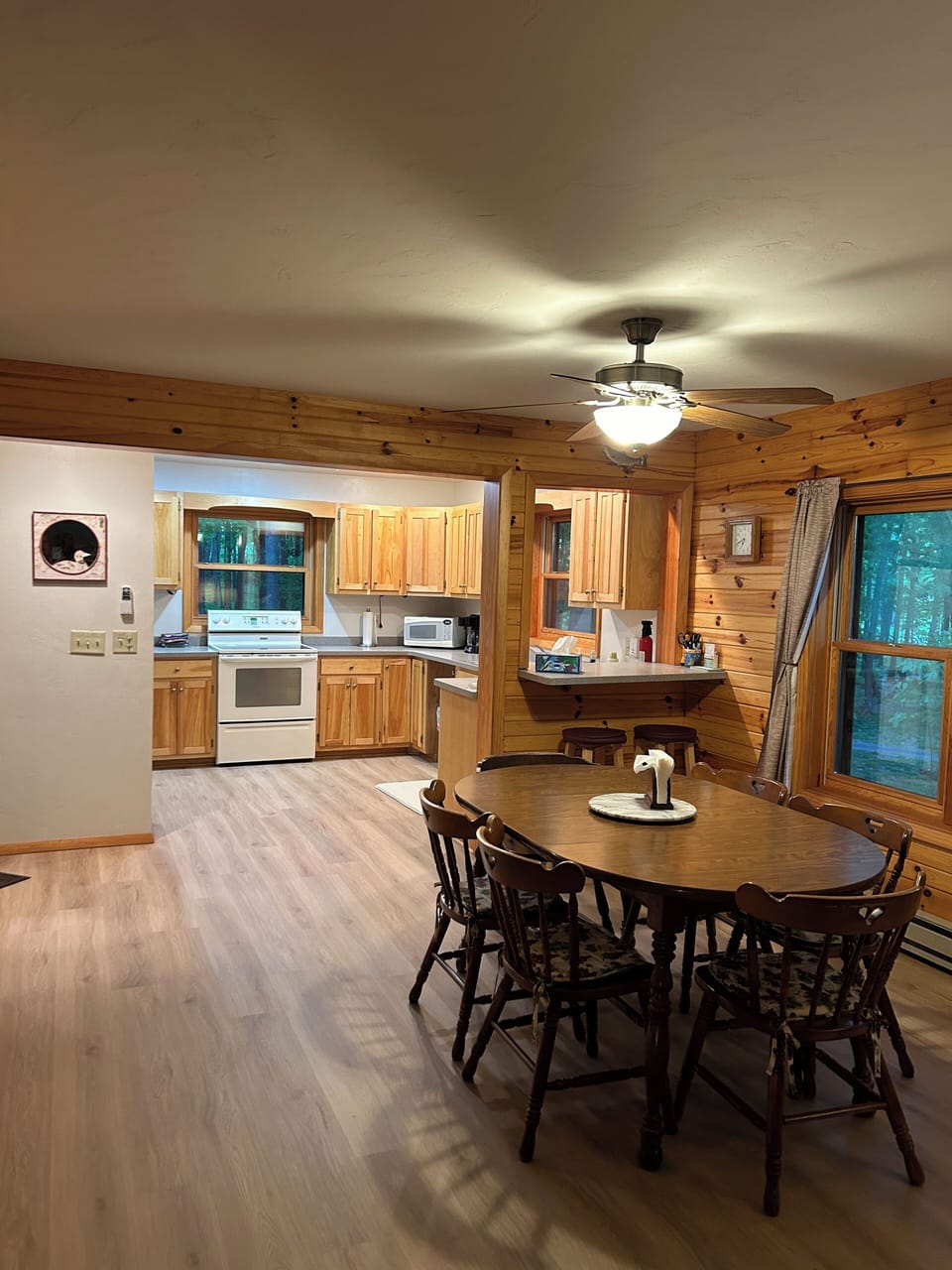 Dining area between the kitchen and living room. Laminate.