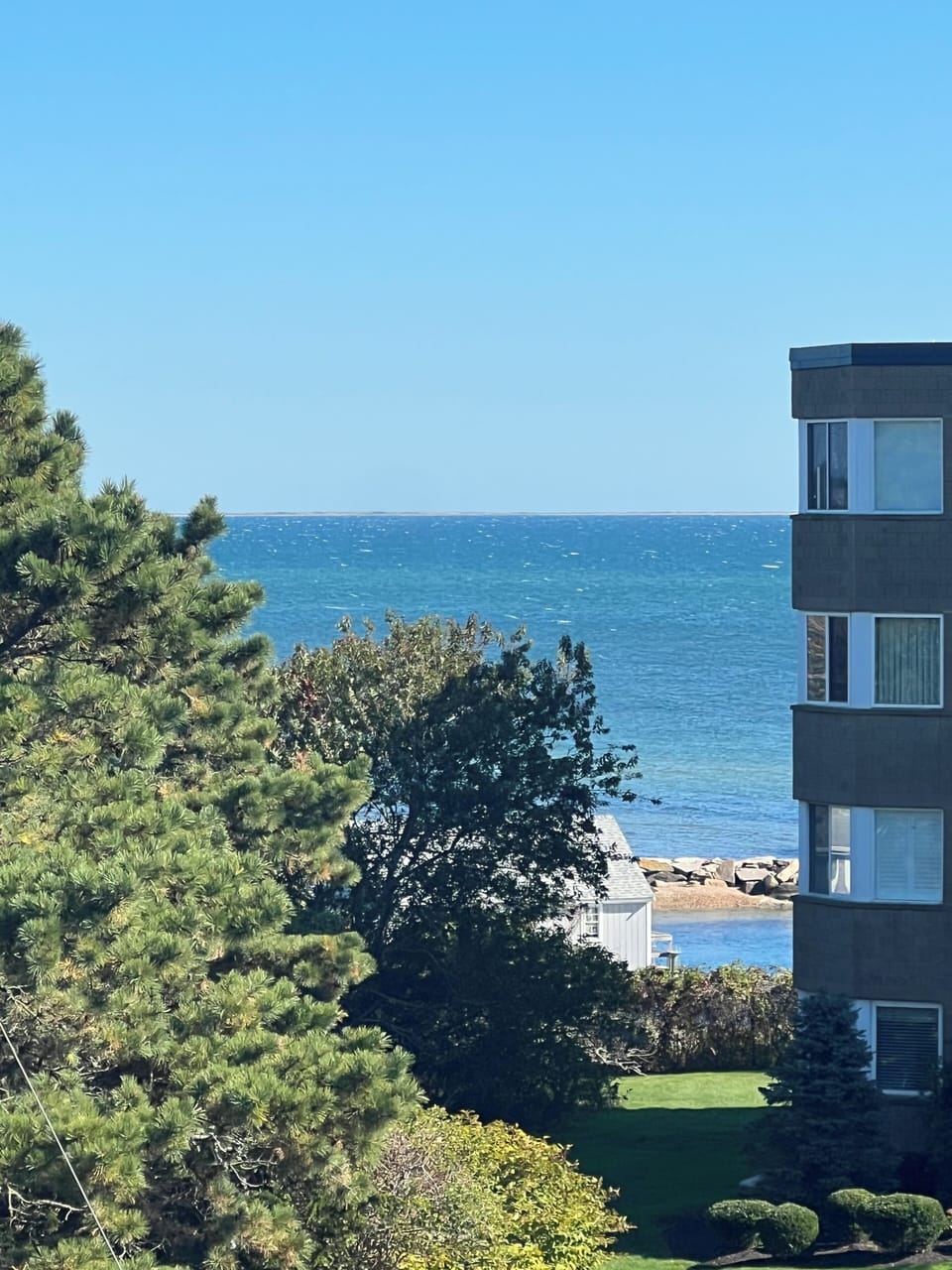 View from the living room and private balcony.