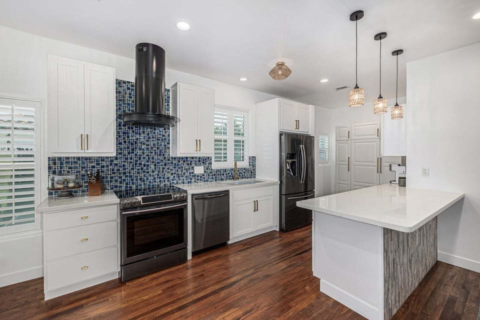 Full kitchen with island and ample counter space