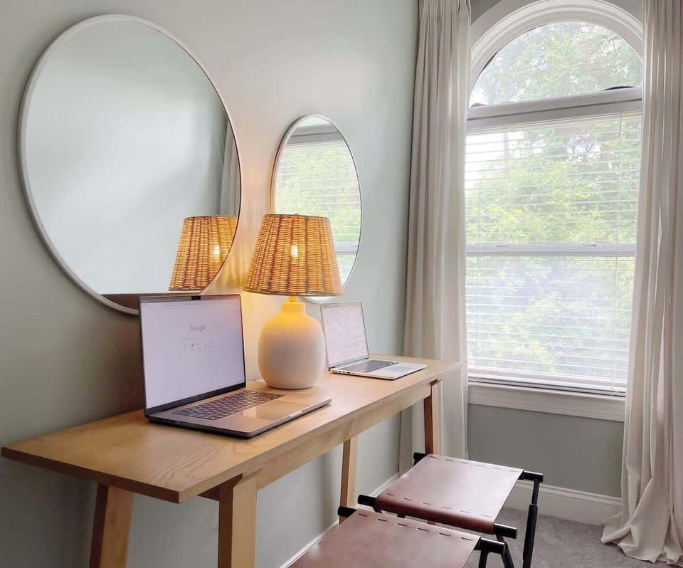 With natural lighting, this multipurpose little nook can be used as a vanity or an office space. 
