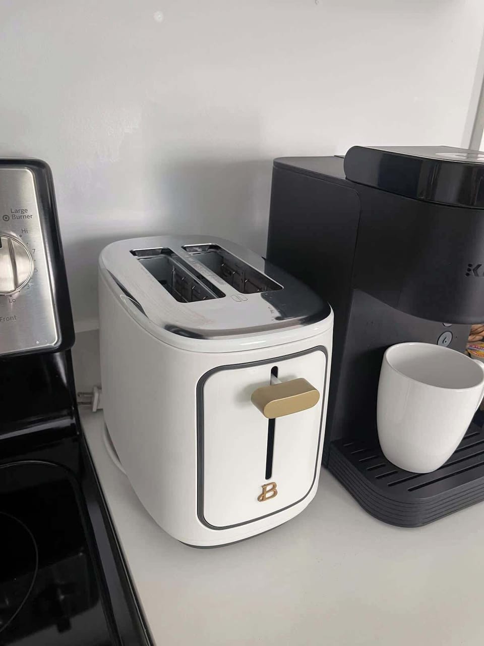 Well-stocked countertops with appliances and essentials ready for your cooking needs.