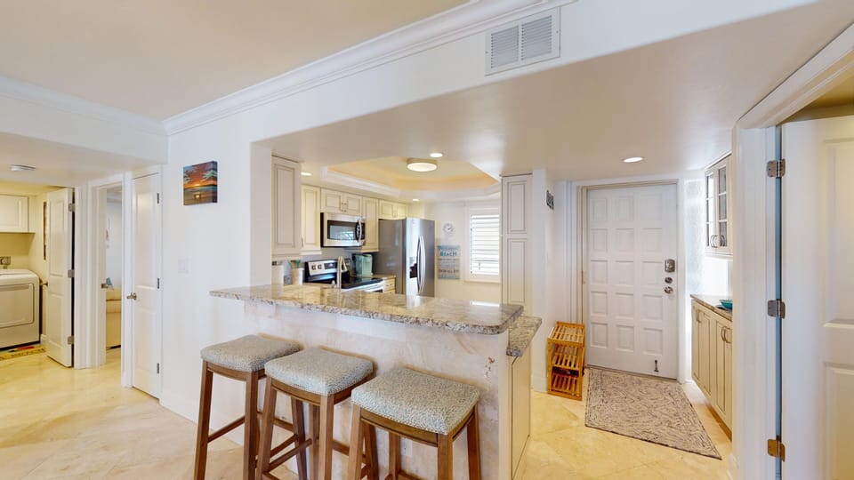 Fully equipped with stainless steel appliances and ample storage