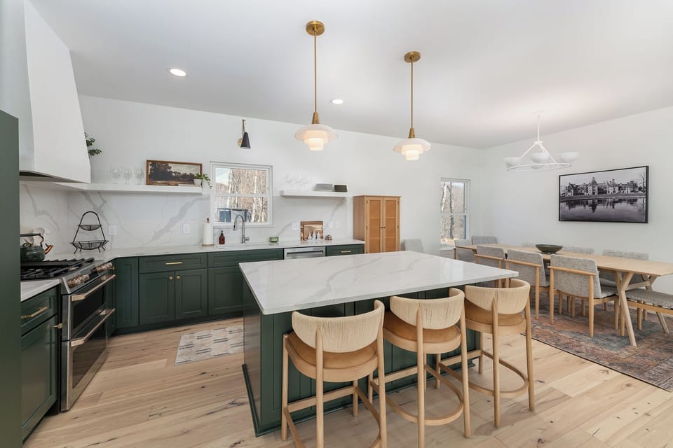 Craft delicious meals in the gourmet kitchen complete with a gas range stove, dishwasher, and 2 types of coffeemakers (Drip & Keurig).
