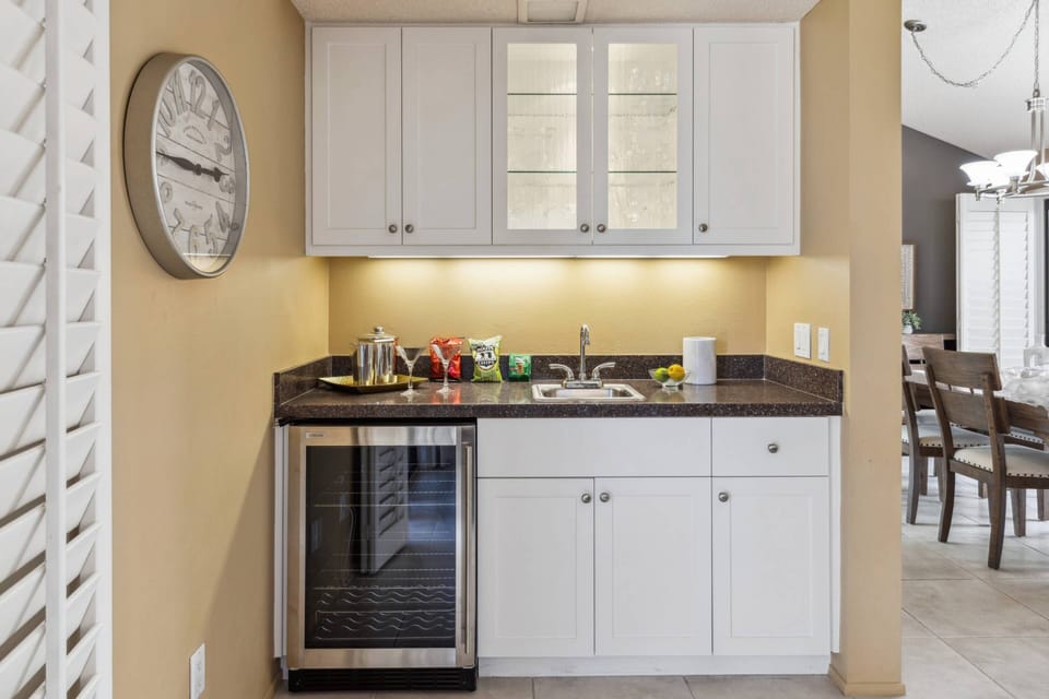 Wet Bar with Refrigerator, Barware, and Snack Storage